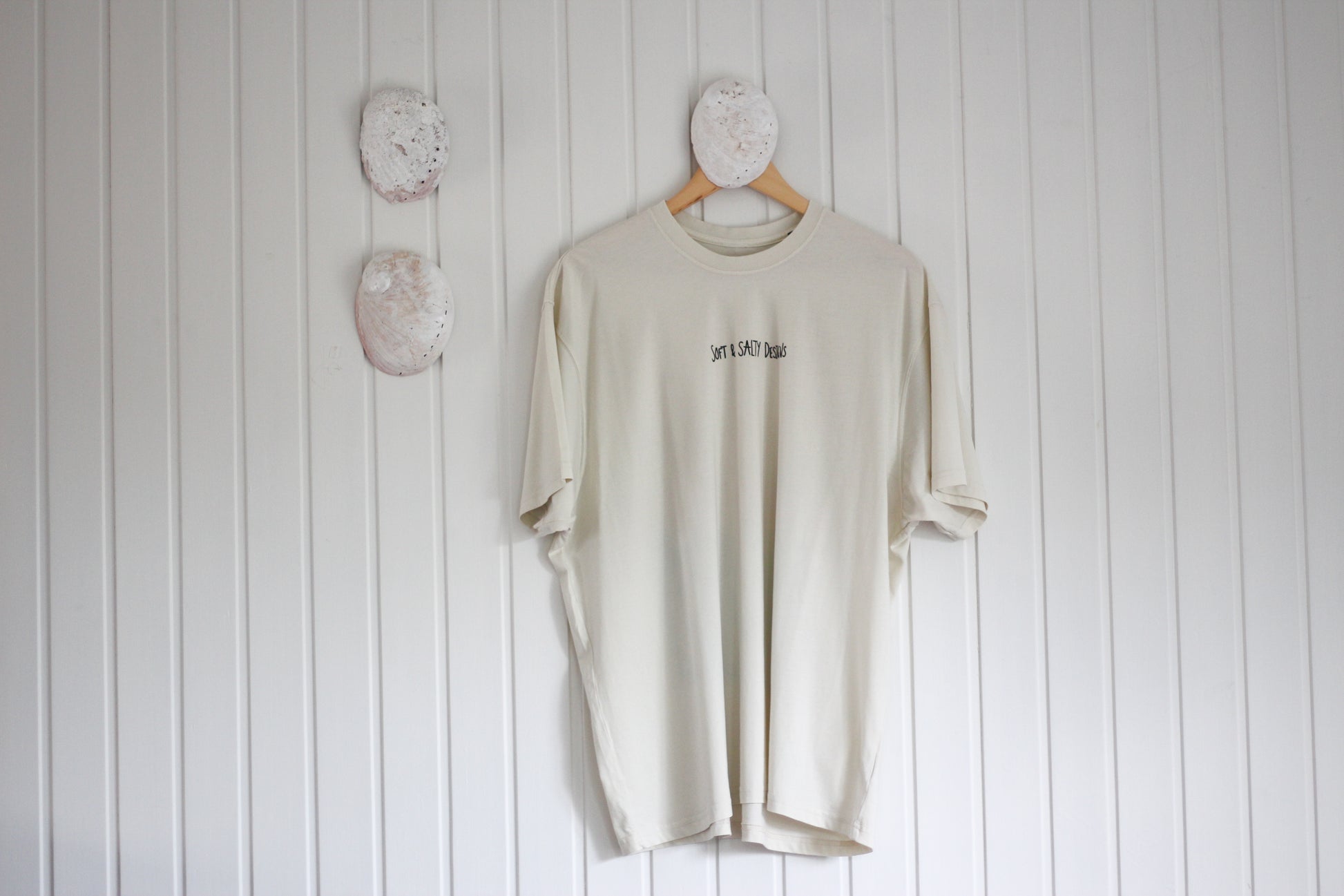 White t-shirt printed with 'Soft & Salty Designs' logo.