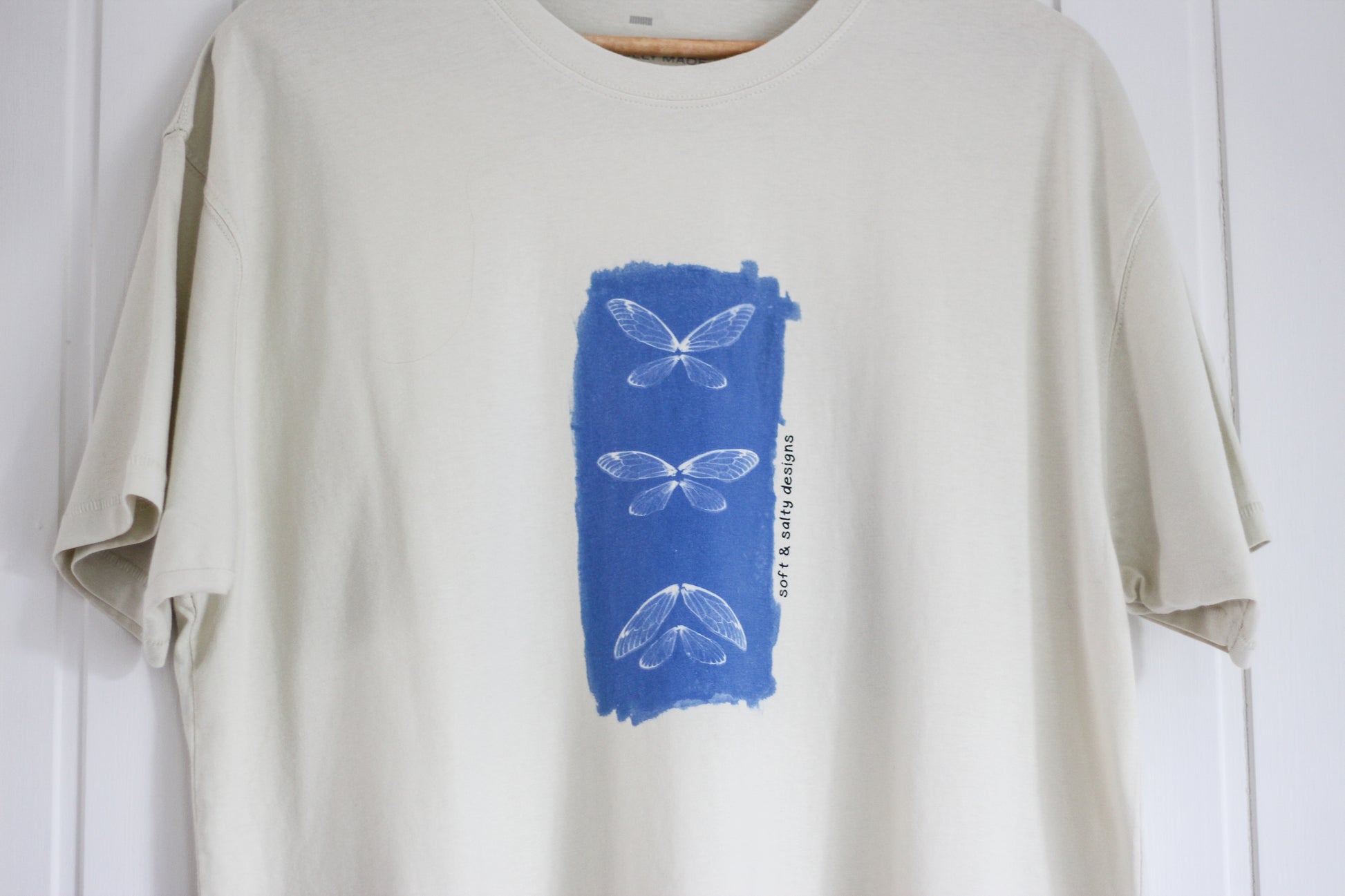 Hand-printed organic cotton tee with cicada wing silhouette