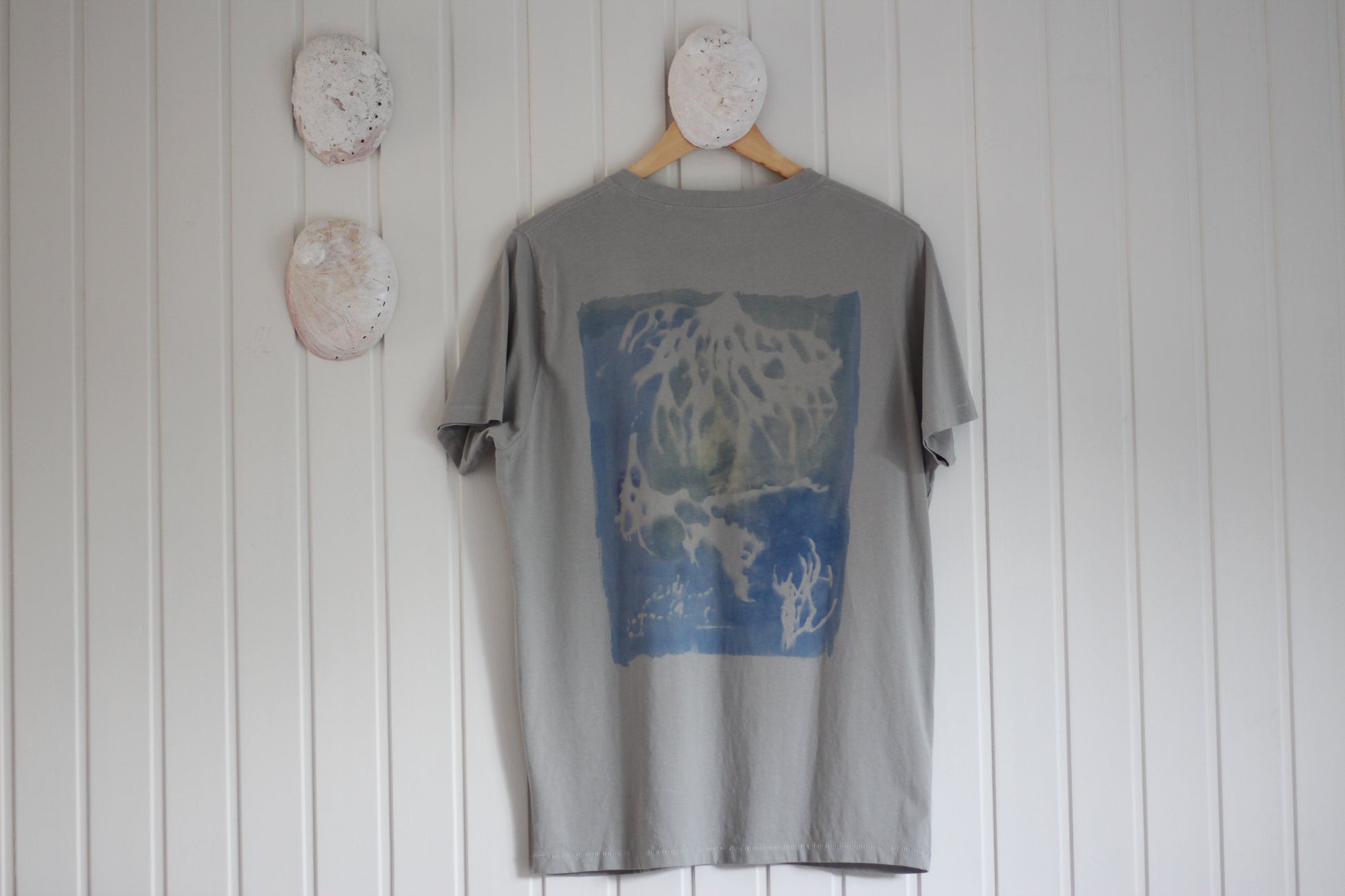 Gray graphic t-shirt with sea sponge hand painted design.