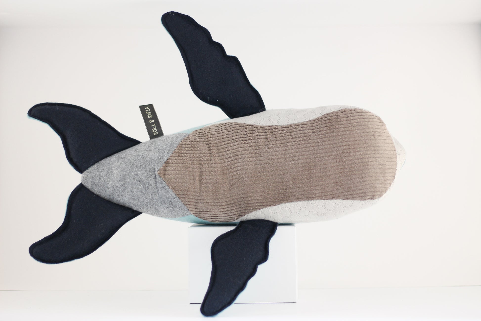 Stuffed toy whale
