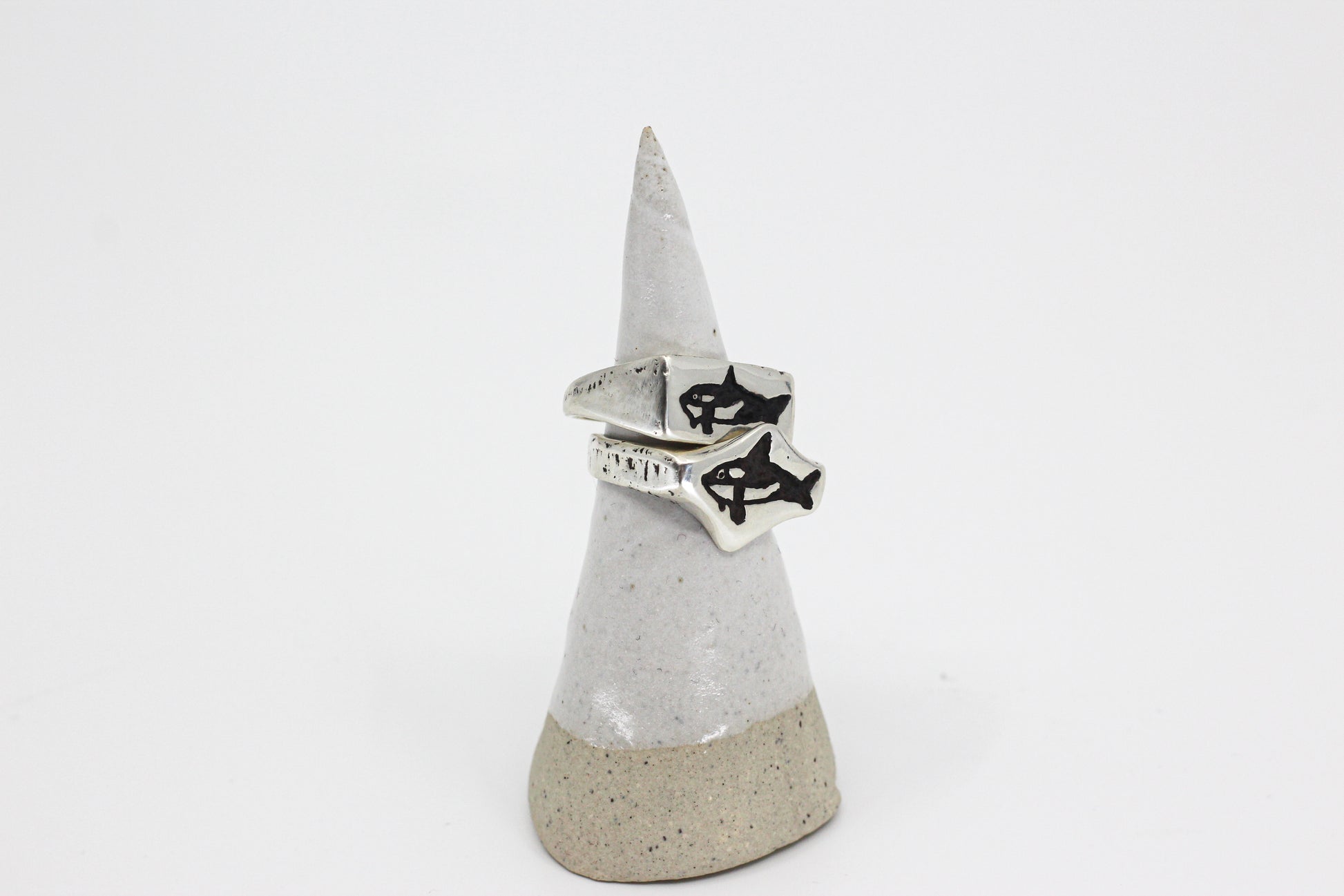 Silver ring engraved with an orca