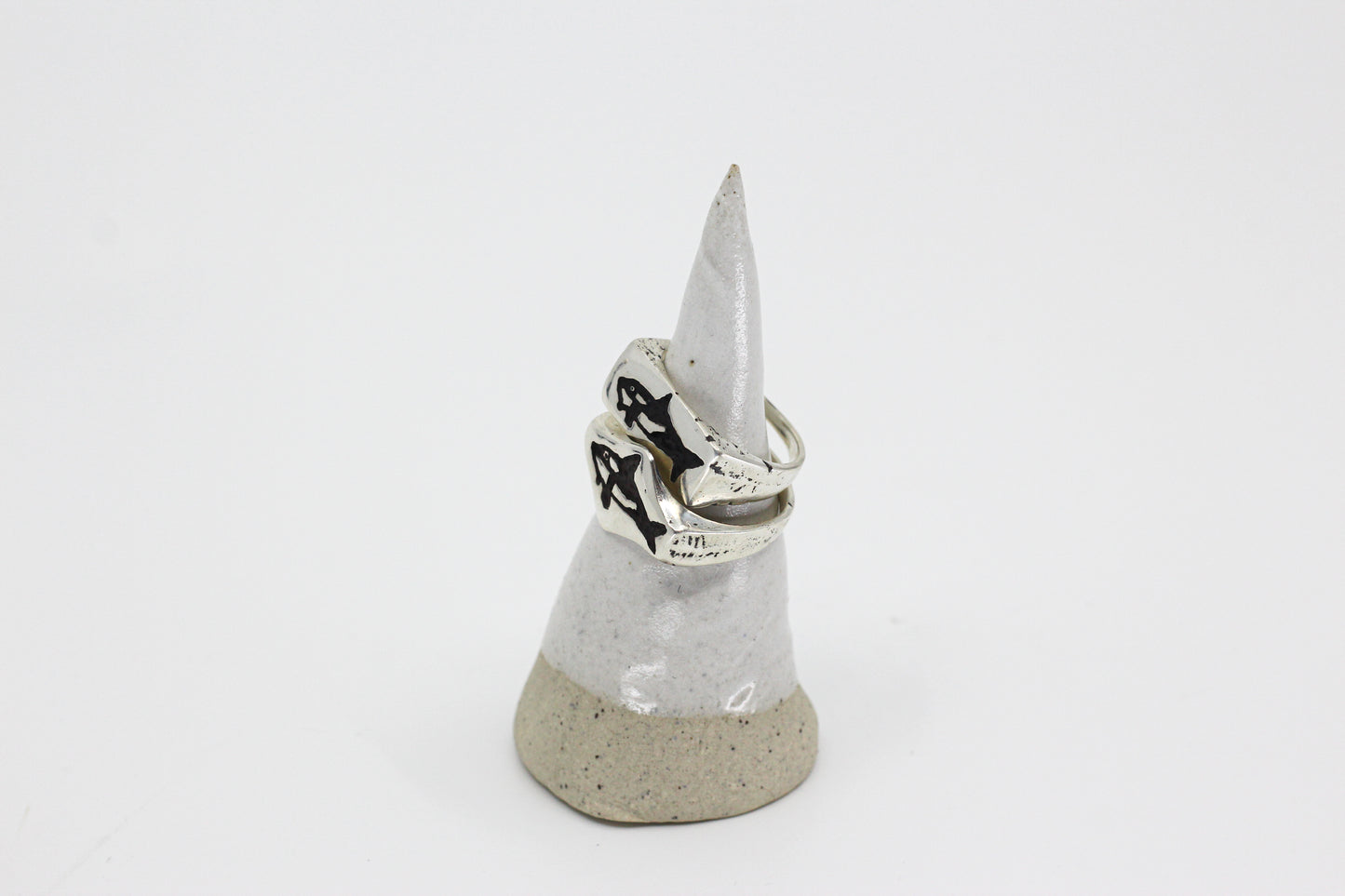 Silver ring engraved with an orca