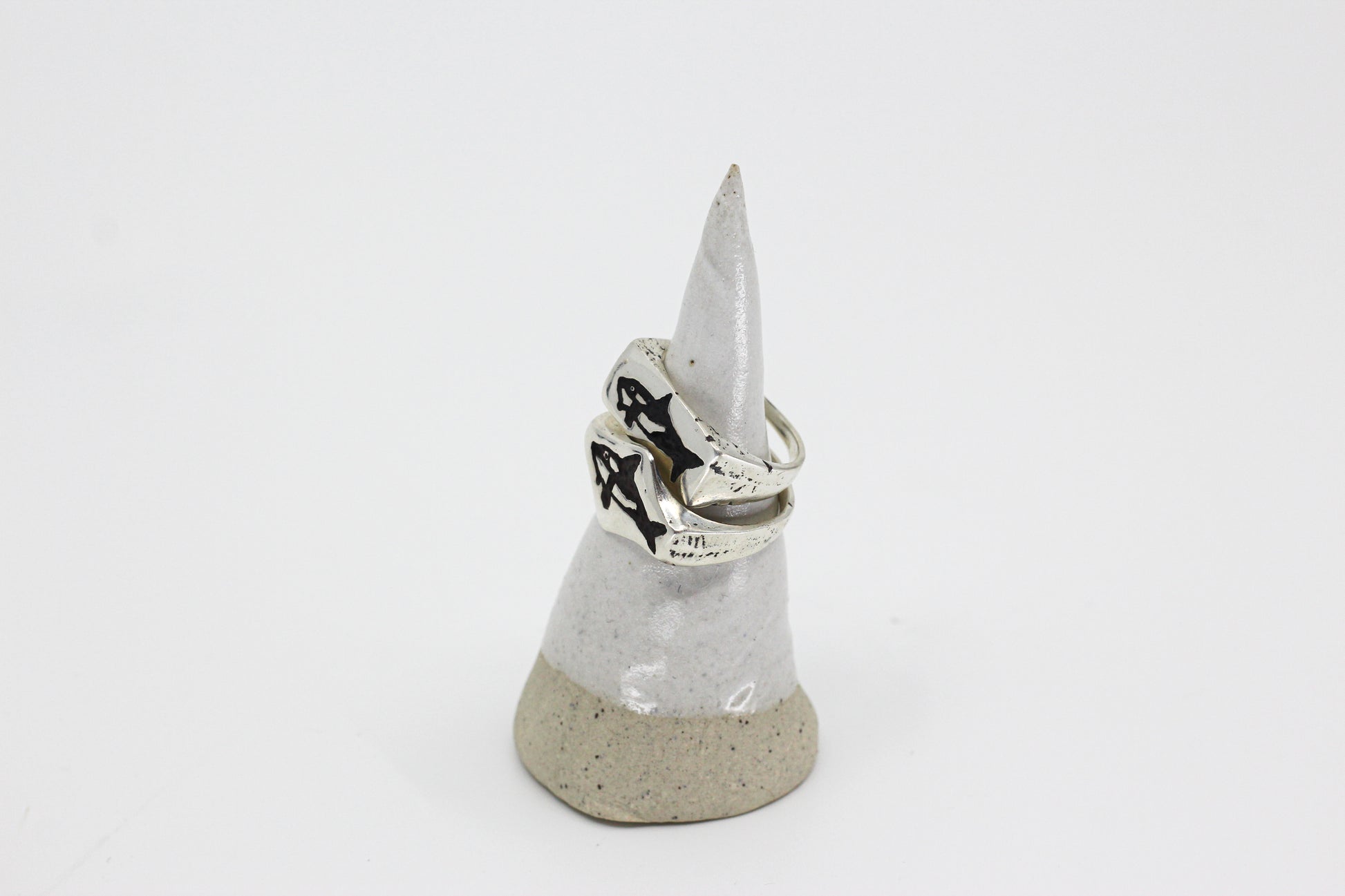 Silver ring engraved with an orca