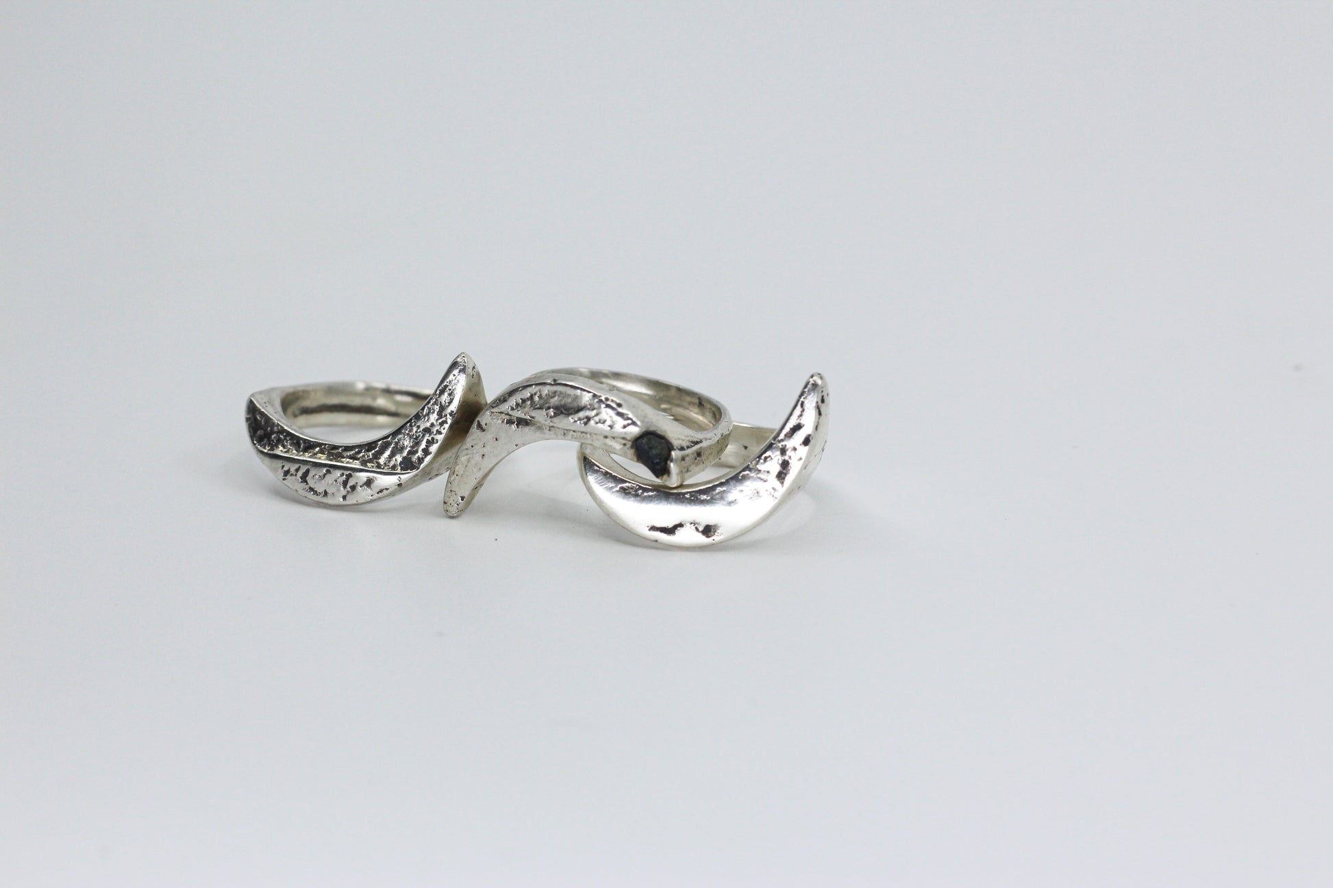 Three crescent moon rings textured silver