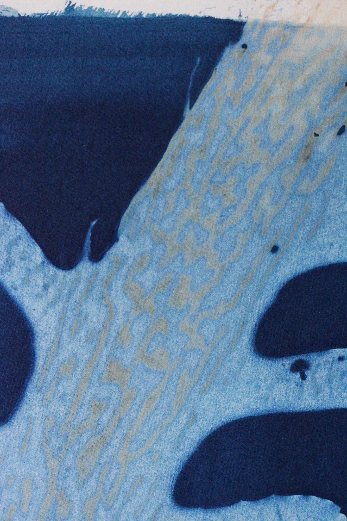 Abstract blue and navy patterned artwork with textured organic shapes and light blue veining.